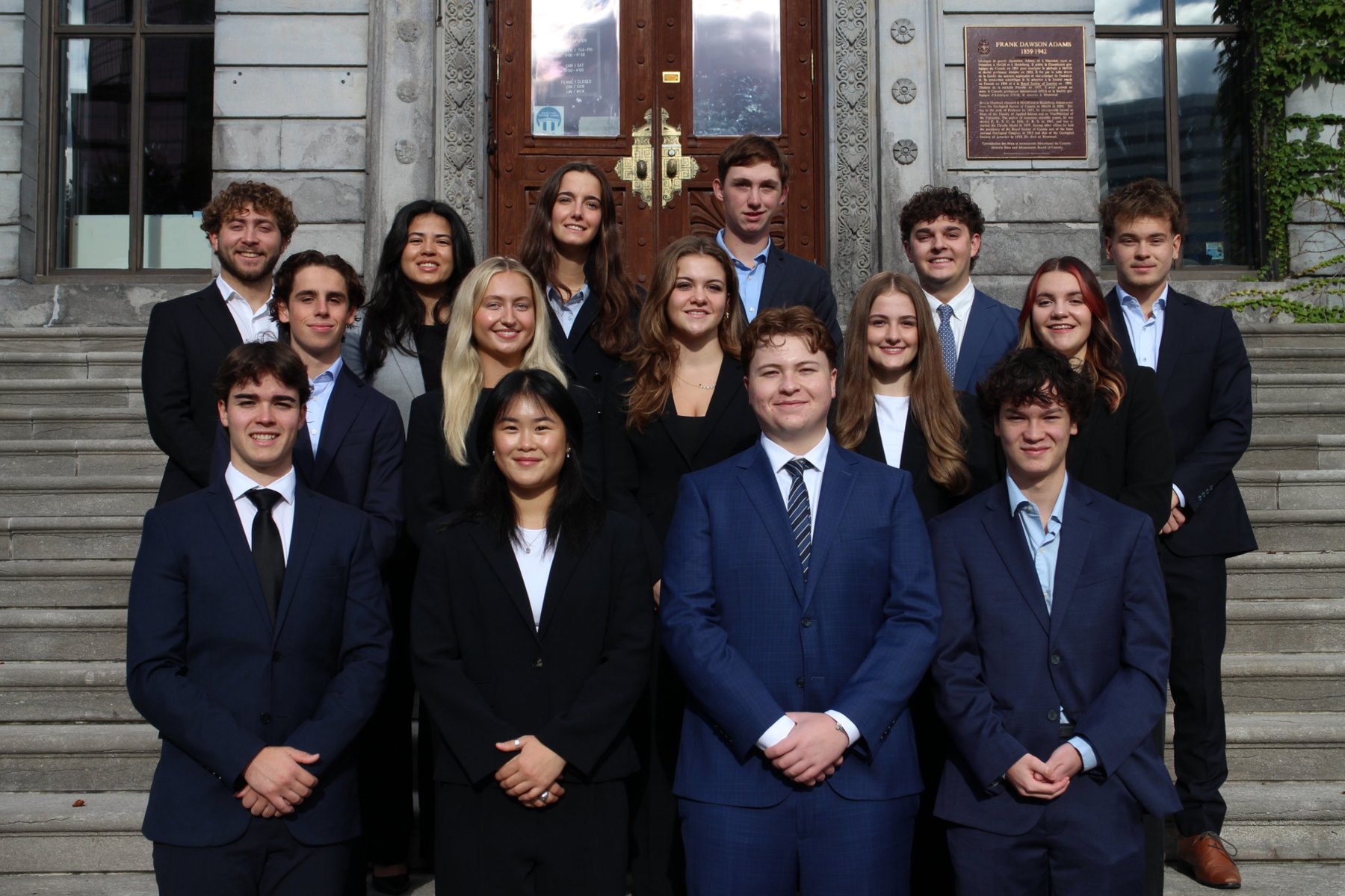 The 2026–27 MSMC executive team on the steps of the Frank Dawson Adams Building